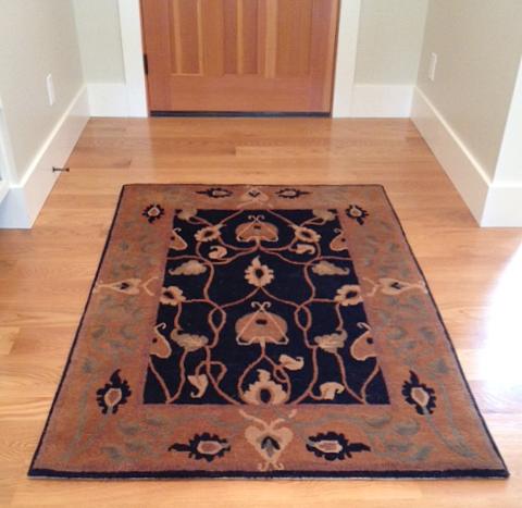 estate evening rug installed in an entryway